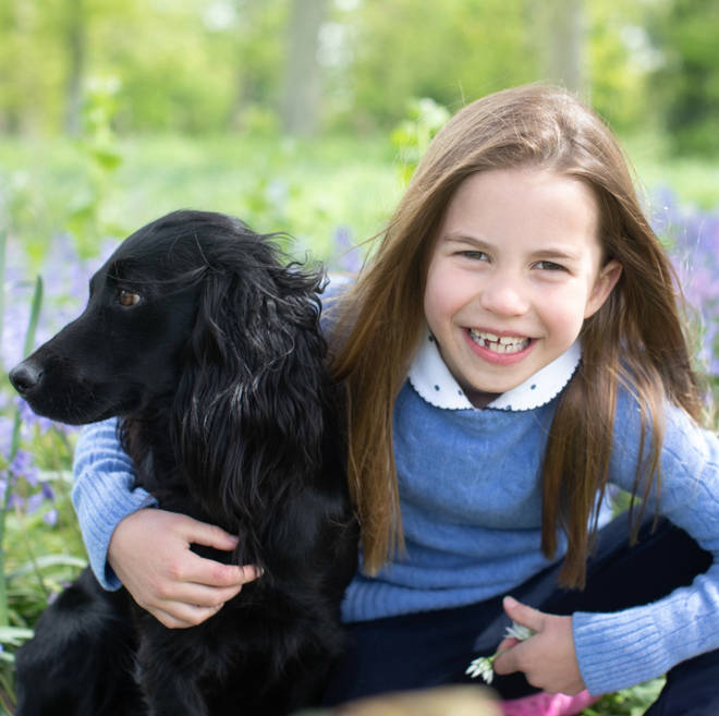Princess Charlotte posed with Orla the cocker spaniel in her birthday pictures