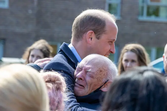 The Duke of Cambridge looked more than happy to hug the emotional man