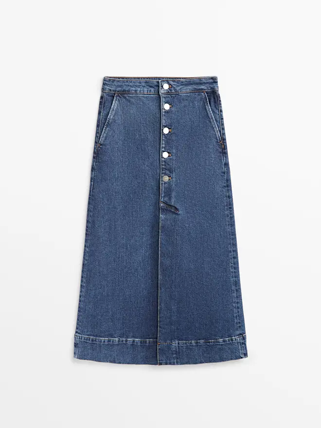 Holly Willoughby is wearing a denim skirt from Massimo Dutto