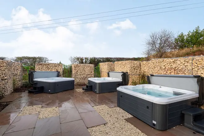 The home has three hot tubs