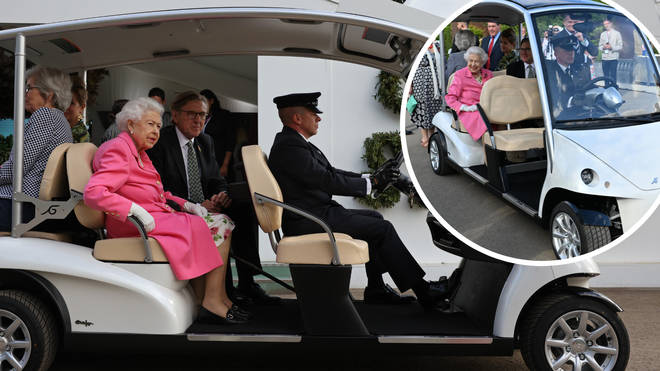 The Queen was shown around The Chelsea Flower Show in a buggy driven by a member of the royal household