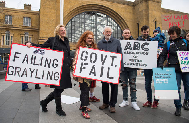 Labour party leader Jeremy Corbyn pictured with protesters outside King's Cross St Pancras station in London