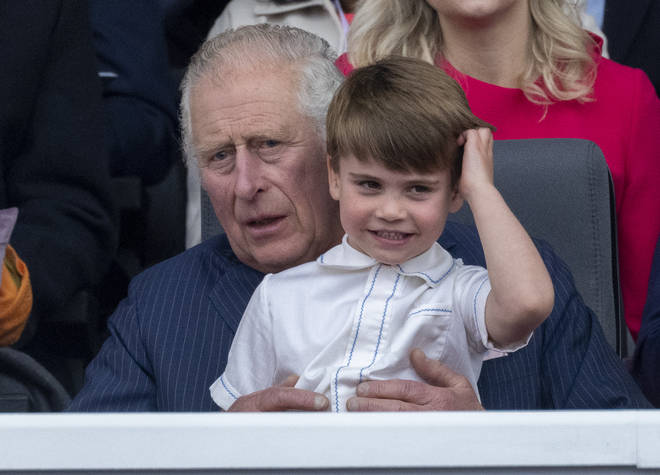 Prince Charles bounced Prince Louis on his knee