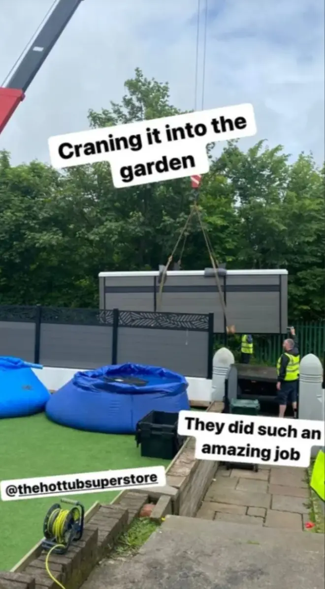 The hot tub was lifted into her garden with a crane