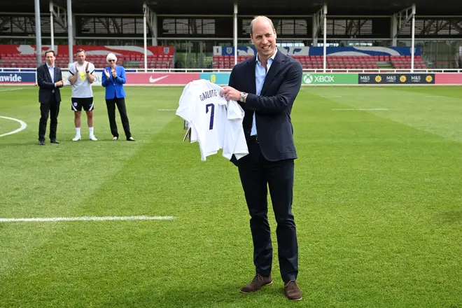 Prince William visited the women's England football team yesterday