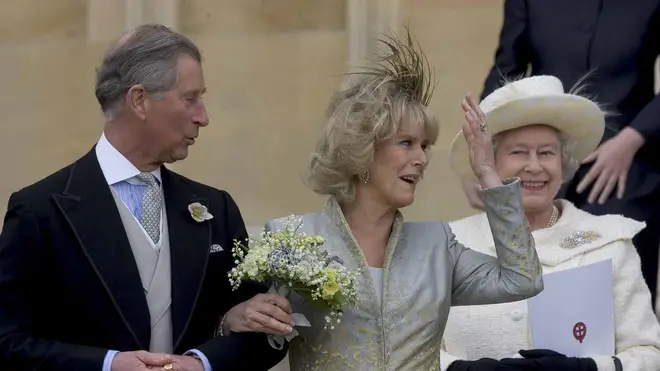 Prince Charles and Camilla leave St George's Chapel in Windsor after having their wedding blessed