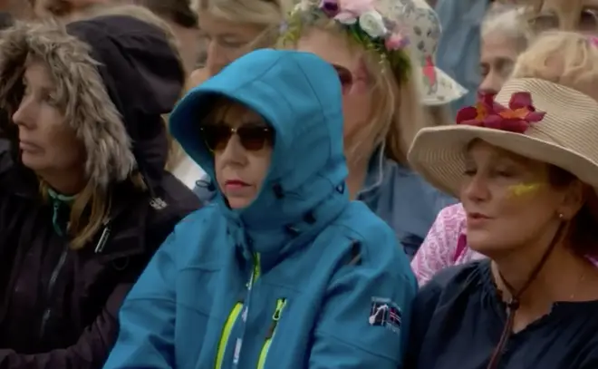The woman, who was compared to the Queen, was watching Robert Plant at the Pyramid Stage
