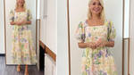 Holly Willoughby is wearing a yellow and green midi dress