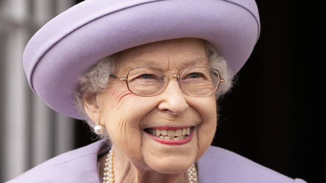The Queen beamed as she watched the Act of Loyalty parade