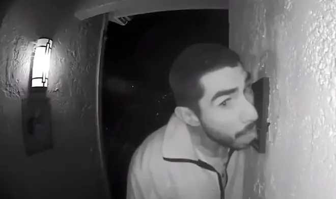 Roberto Daniel Arroyo was caught licking his neighbour's doorbell on CCTV
