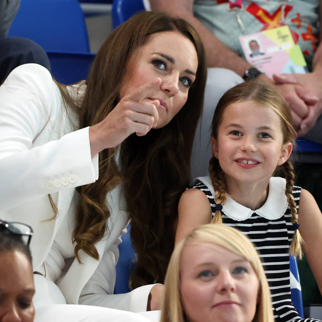 Kate Middleton could be seen explaining the swimming competition to Princess Charlotte