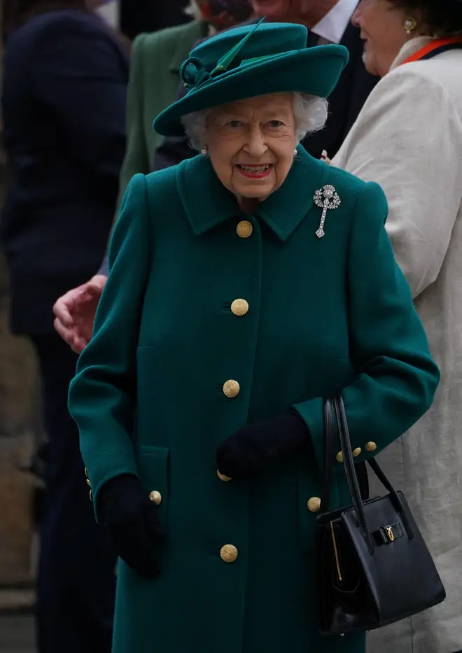 Queen Elizabeth in Emerald suit