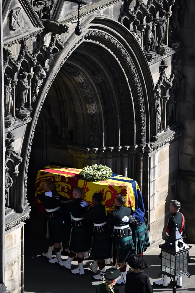 The Queen's coffin was carried into St Giles' Cathedral for the Service of Thanksgiving