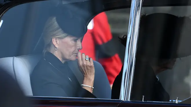 Sophie Wessex, Prince Edward's wife, looked moved as she travelled in a car behind the Queen's procession with Camilla, Queen Consort