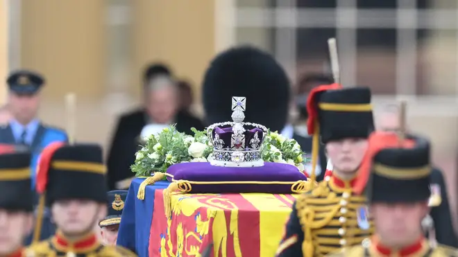 The Queen's coffin was draped in the Royal Standard with the Imperial State Crown placed on top