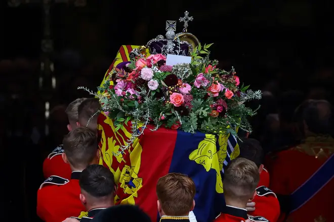There is a note on the Queen's coffin