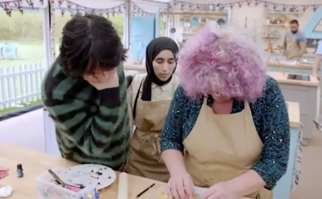 Bake Off presenter Noel reassured Carole that her biscuit mask still looked great