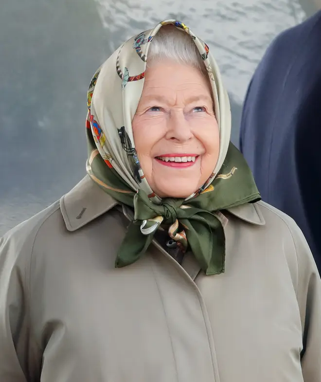 The Queen wears one of her Hermes scarves while attending the Royal Windsor Horse Show in 2019