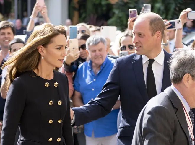 Prince William and Kate Middleton dress in mourning clothing as they arrive at Windsor Guildhall