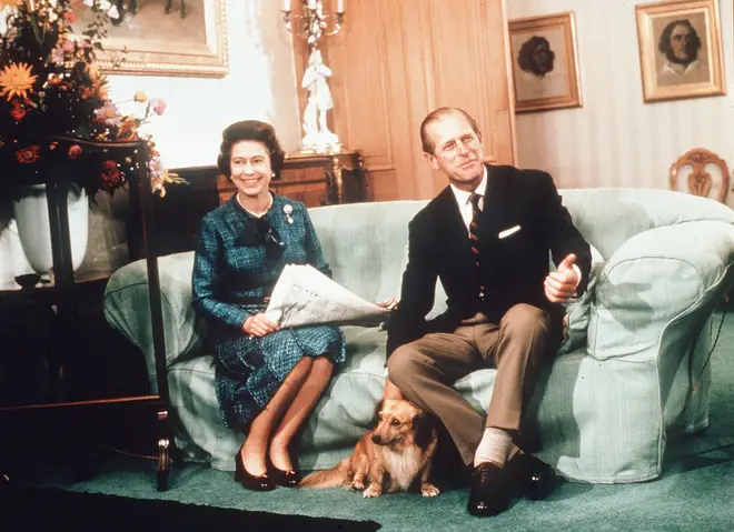 The Queen and Prince Philip with one of their beloved corgis in 1974 at Balmoral Castle
