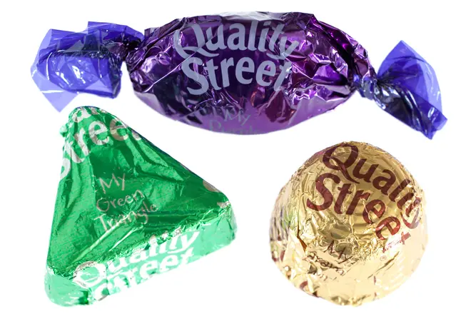 Quality Street chocolates - purple one, green triangle and caramel