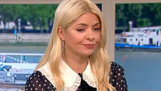 Holly Willoughby appears annoyed in the moment Phillip Schofield cuts her off during a This Morning interview