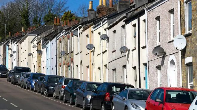 A woman was banned from parking outside her neighbour's house
