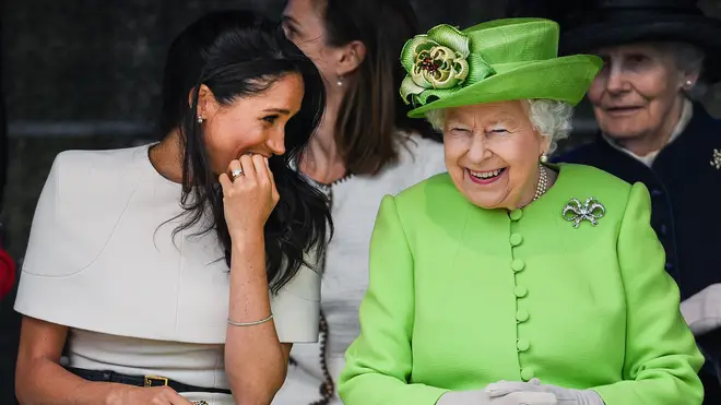 Meghan Markle and the Queen laugh together during their first royal engagement together back in 2018