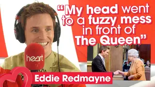 Eddie Redmayne recalls the moment he met the Queen