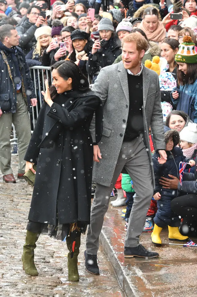 Meghan Markle and Prince Harry arrived a little late due to the weather