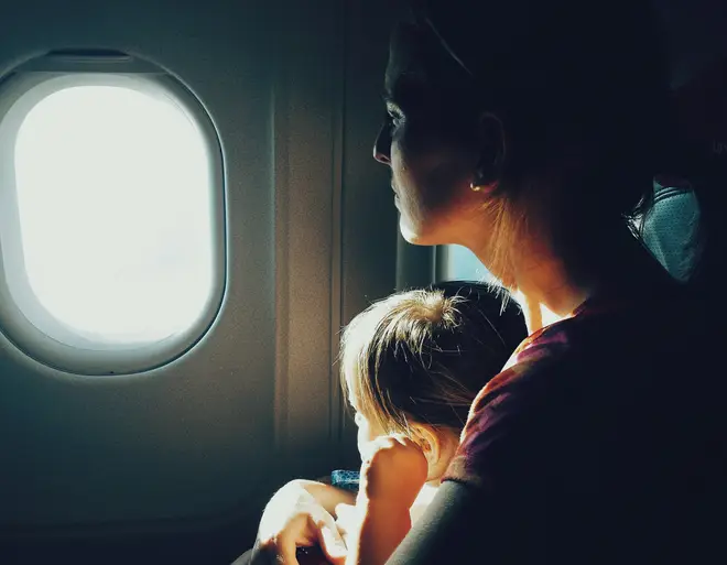 The mum was met by 'huffs and puffs' from a man when she boarded a plane with her toddler (stock image)
