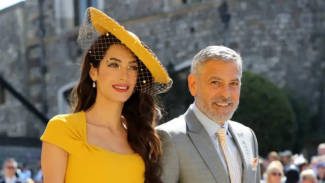 George and Amal Clooney at the royal wedding in 2018