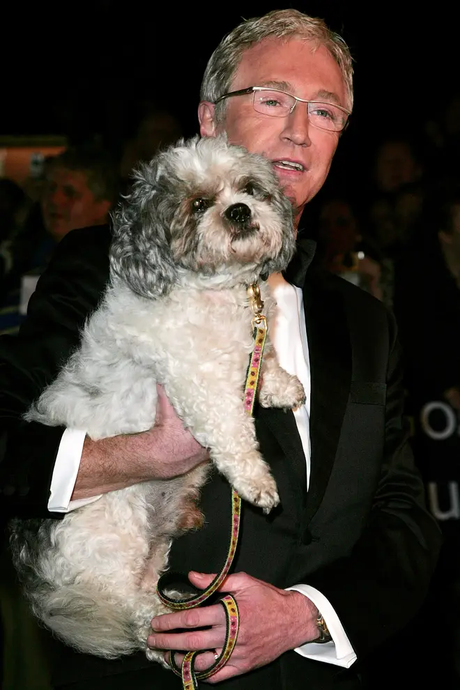 Paul O'Grady - pictured with his previous dog Buster in 2005 - is mourning the death of his epileptic pet