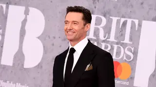 Hugh Jackman was all smiles as he arrived at the Brit Awards