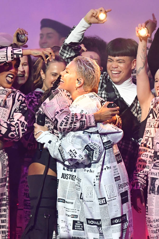 Pink's jacket shared messages of the Me Too movement