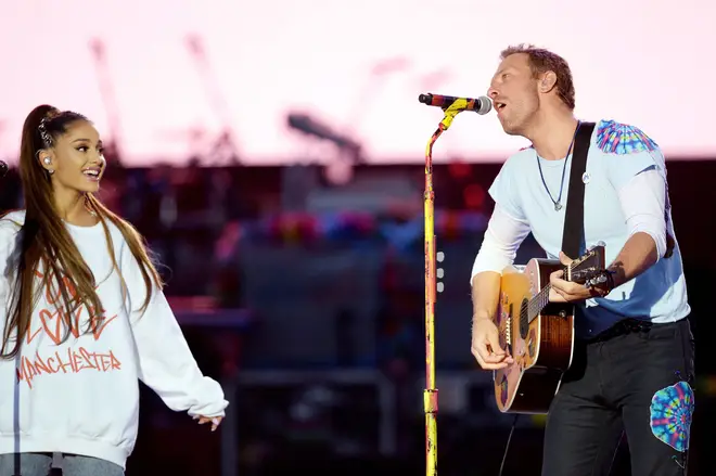 Ariana Grande performing with Chris Martin from Coldplay at One Love Manchester