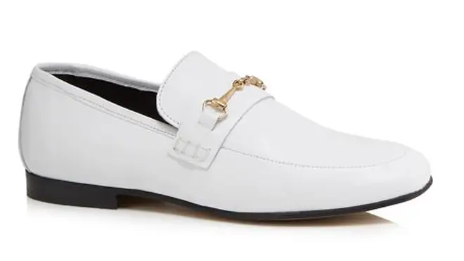 Kelly finished the look off with the white leather 'Janet' loafers