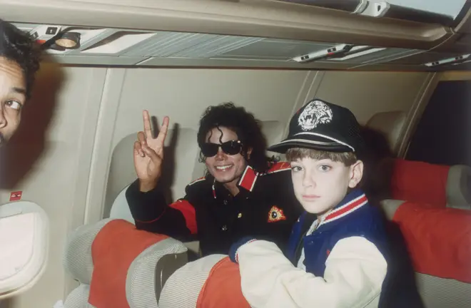 Michael Jackson with 10 year old Jimmy Safechuck on the singer's tour plane