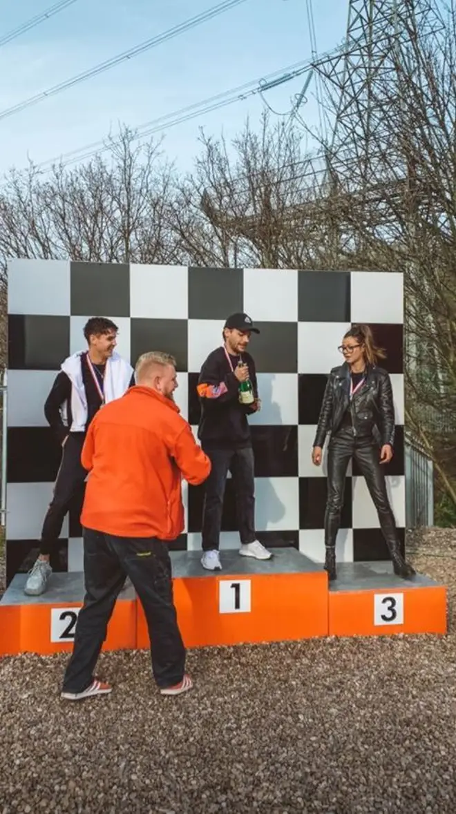 Louis Tomlinson celebrates Phoebe and Daisy's 15th birthdays at a go-karting track