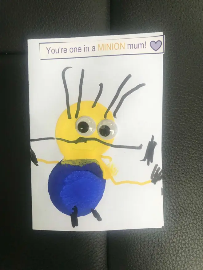 Little girl makes a handmade card for her mum in heaven