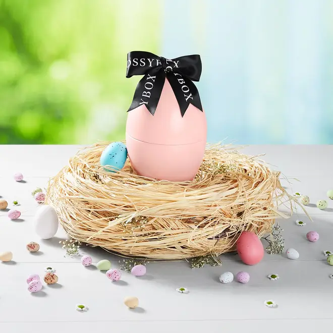 Glossybox's egg comes in the classic pink shade everyone associates with their monthly beauty boxes and has the same black bow