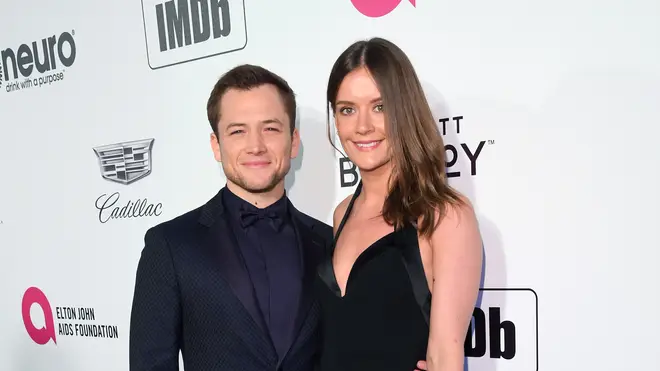 Taron Egerton and Emily Thomas attend the 27th annual Elton John AIDS Foundation Academy Awards Viewing Party