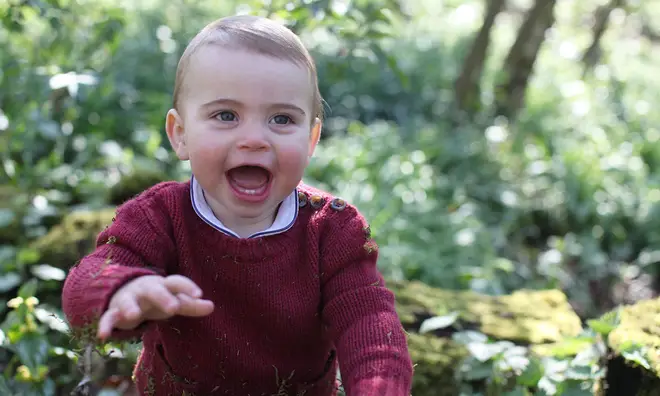 Prince Louis flashes a cheeky grin in new photos released by Kensington Palace