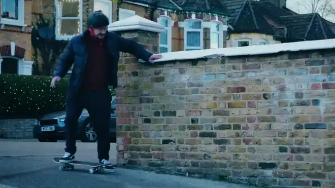 A dad learning how to skate in the John Lewis advert 2022