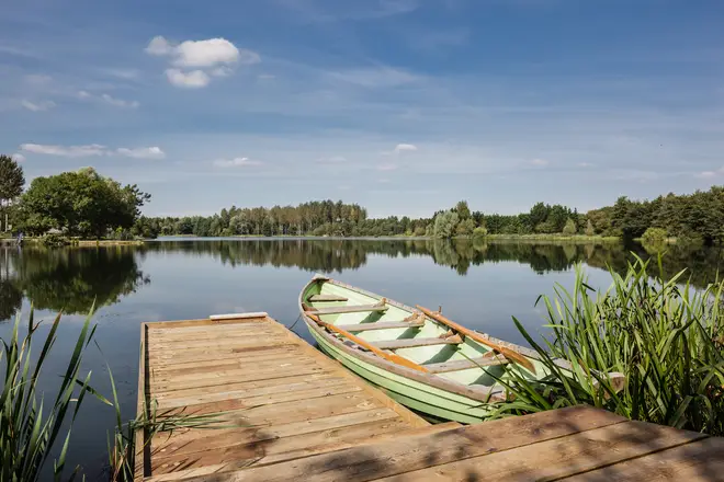 Explore the serene lake by rowing boat or relax on your private deck