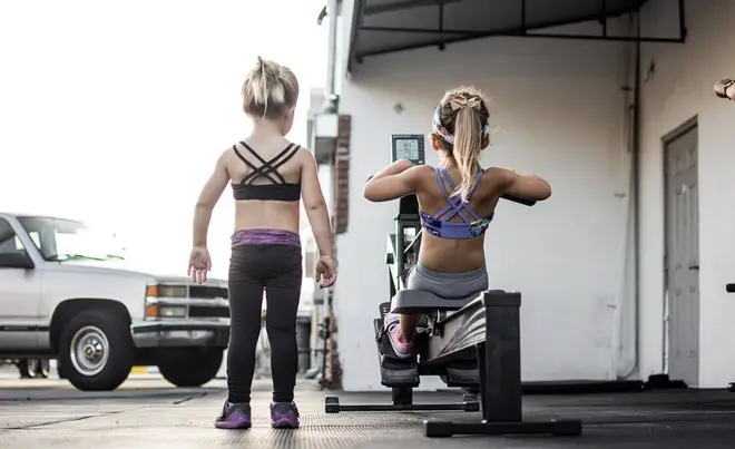 Two young girls were pictured wearing gym gear and working out