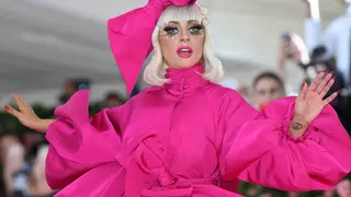 Lady Gaga arrived to the 2019 Met Gala in a dramatic pink gown