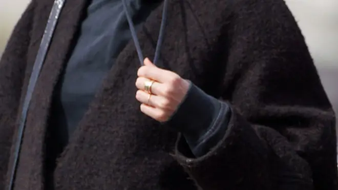 The gold ring on Stacey's finger is rather simple for an engagement ring, but anything is possible