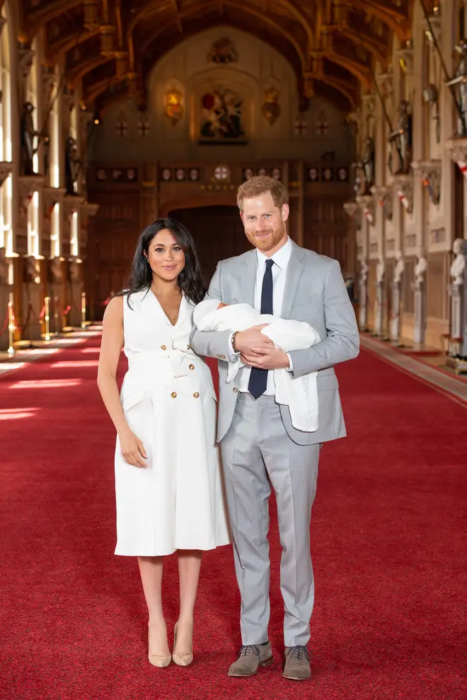 Harry and Meghan beamed as they showed off their newborn son