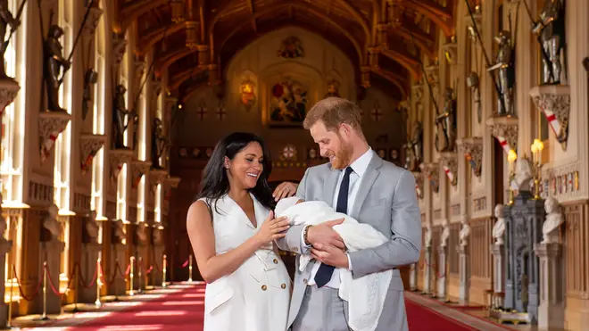 Meghan and Harry looked lovingly at their son